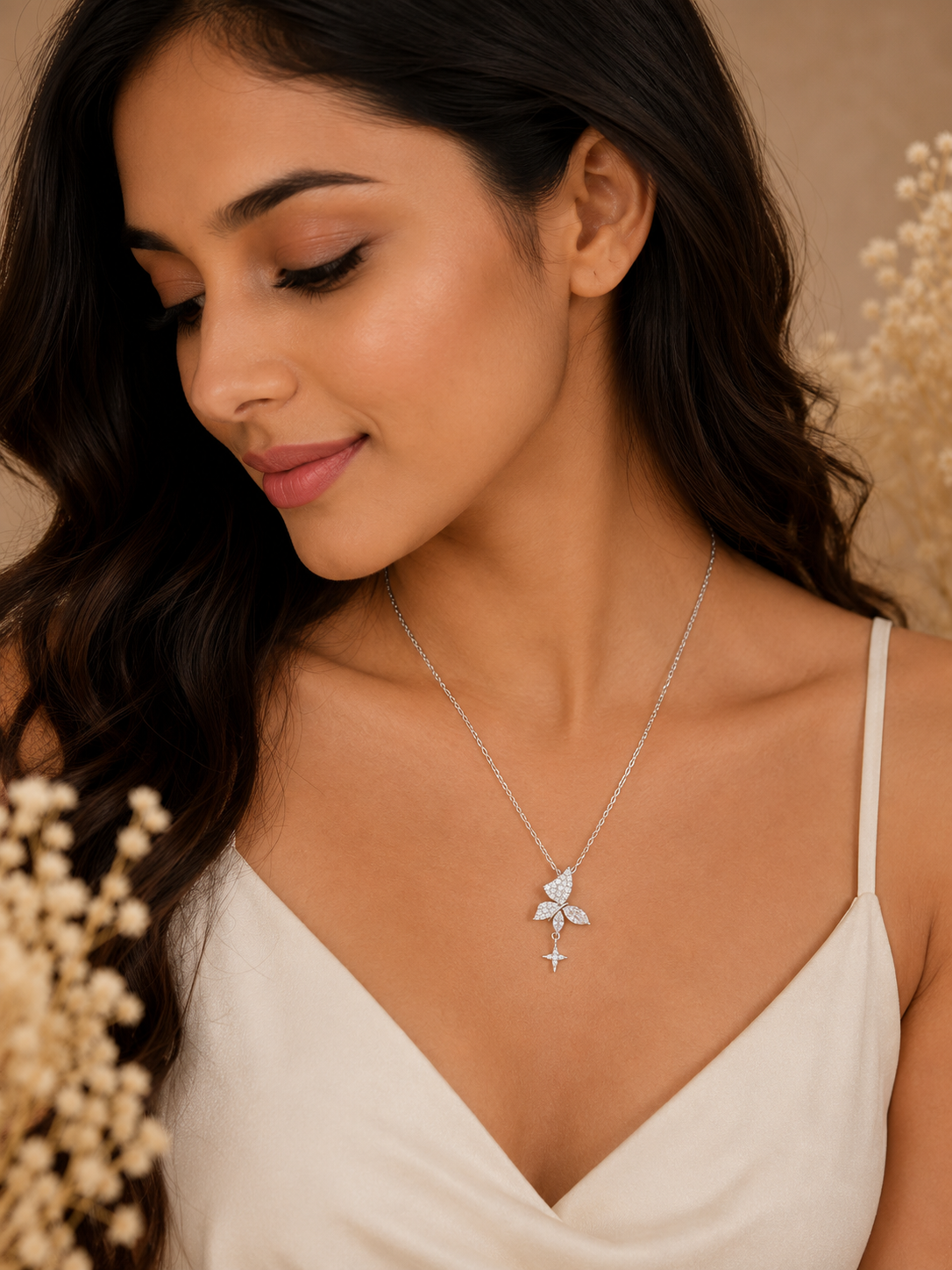 Crystal butterfly and dangling star pendant necklace