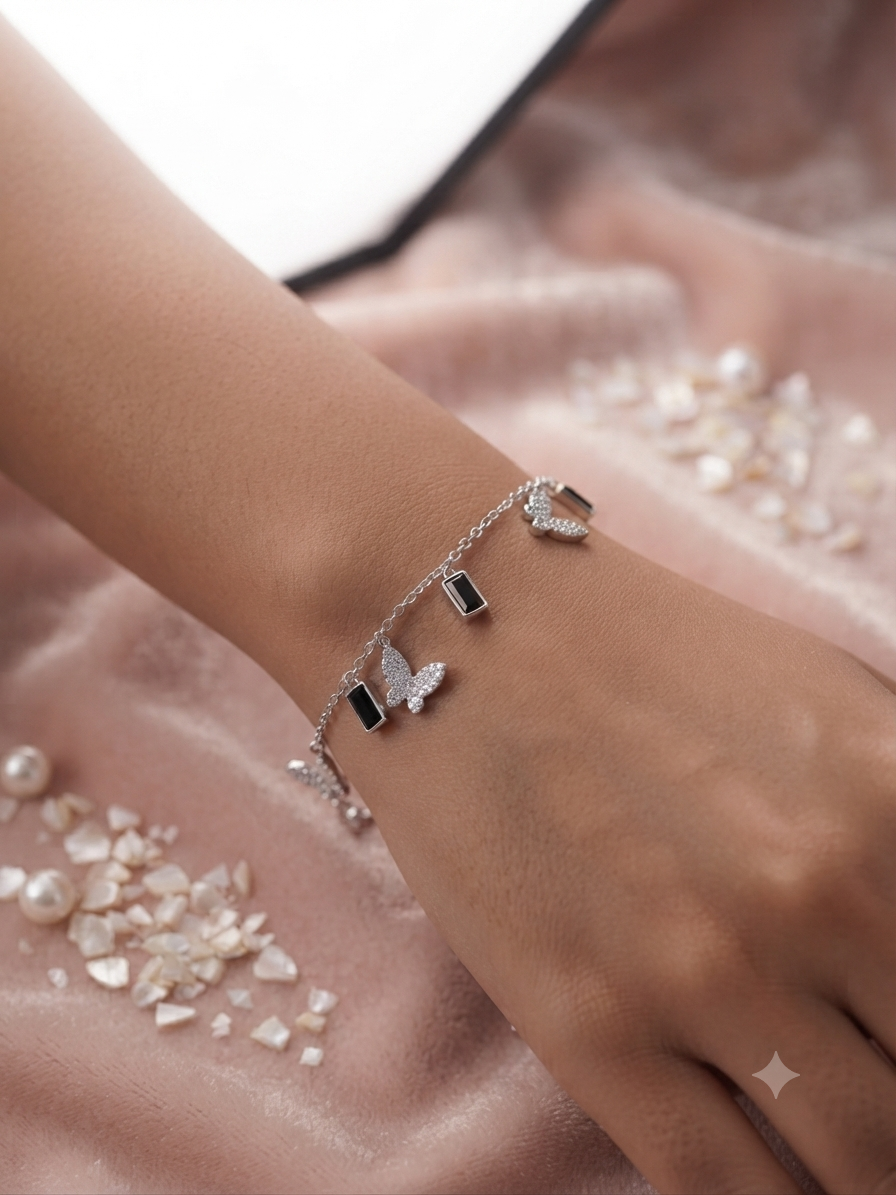 Butterfly and black crystal charm bracelet