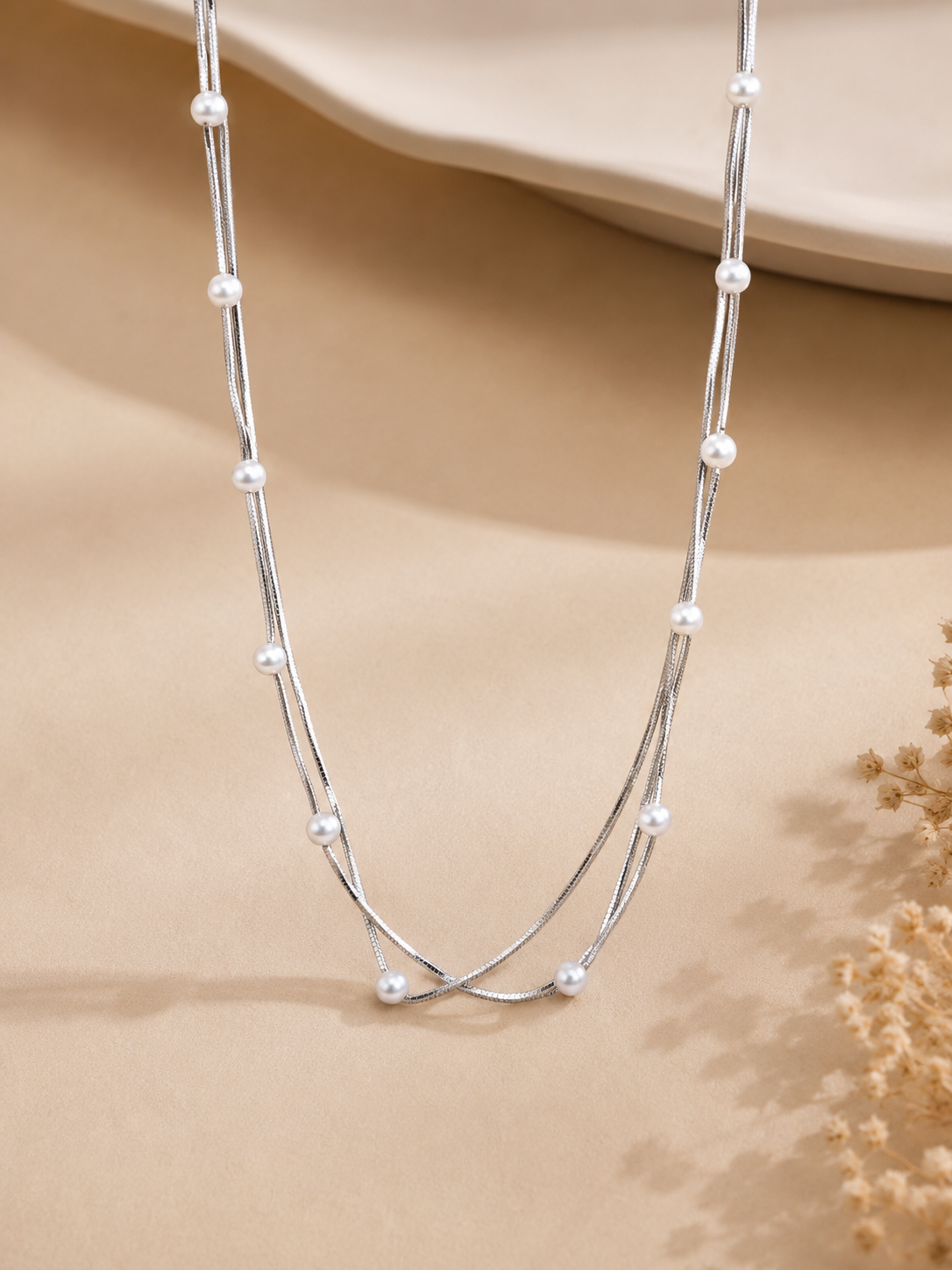 Three layer silver station pearl necklace