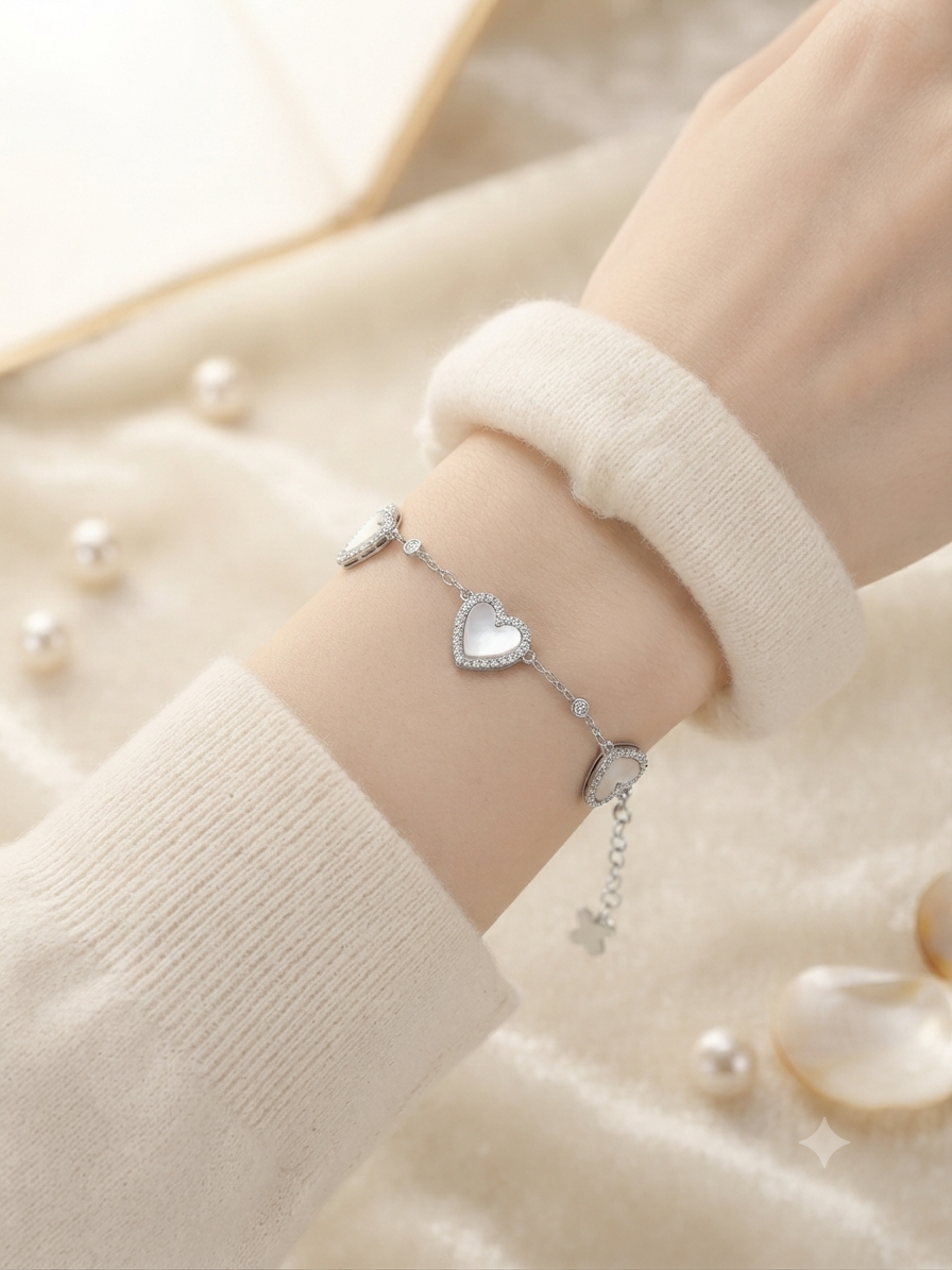 Open heart charm bracelet