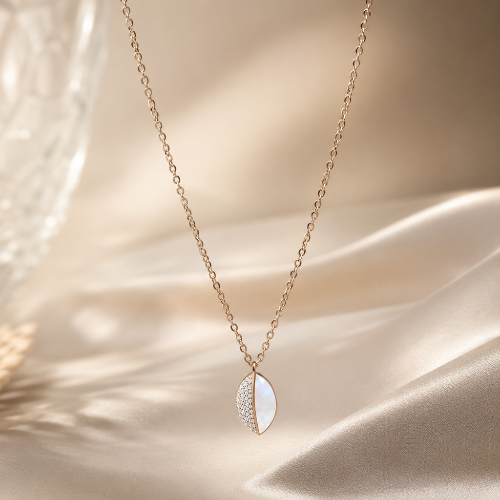 Rose gold mother of pearl and crystal leaf pendant necklace ￼