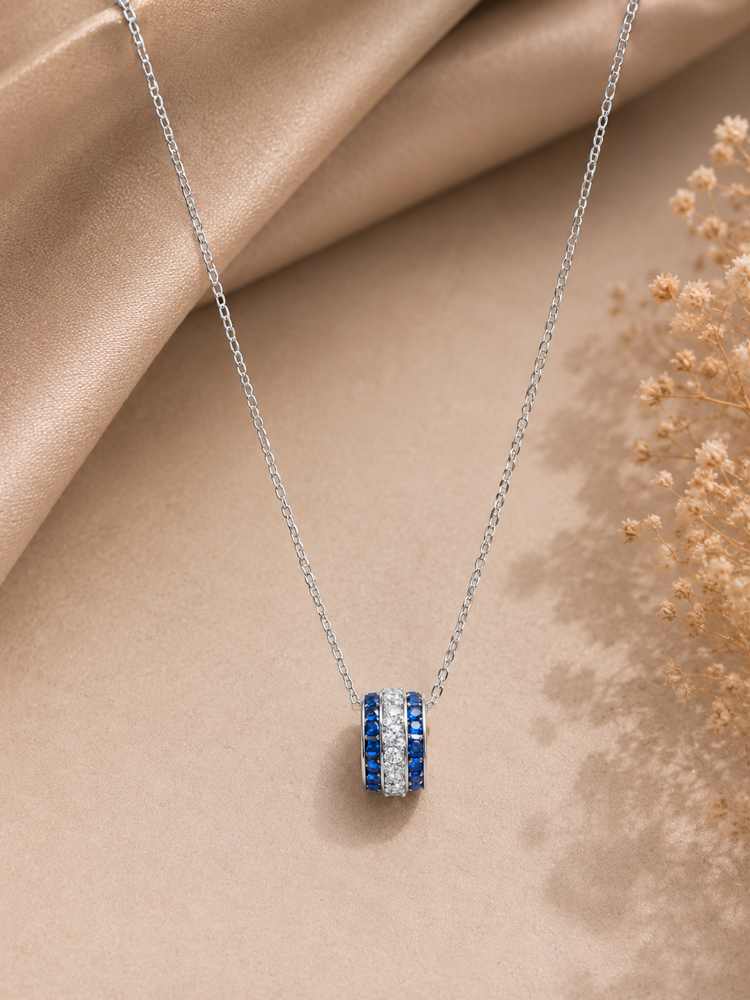 Blue and white crystal barrel pendant necklace