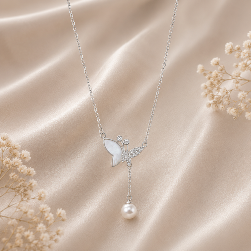 Butterfly mother of pearl and Pearl drop necklace