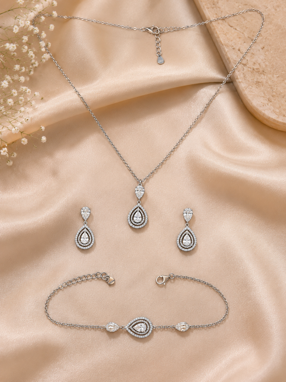 Elegant teardrop crystal halo jewellery set