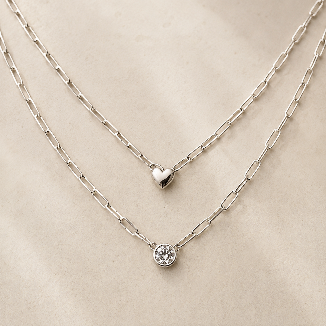 Layered silver heart and solitaire necklace