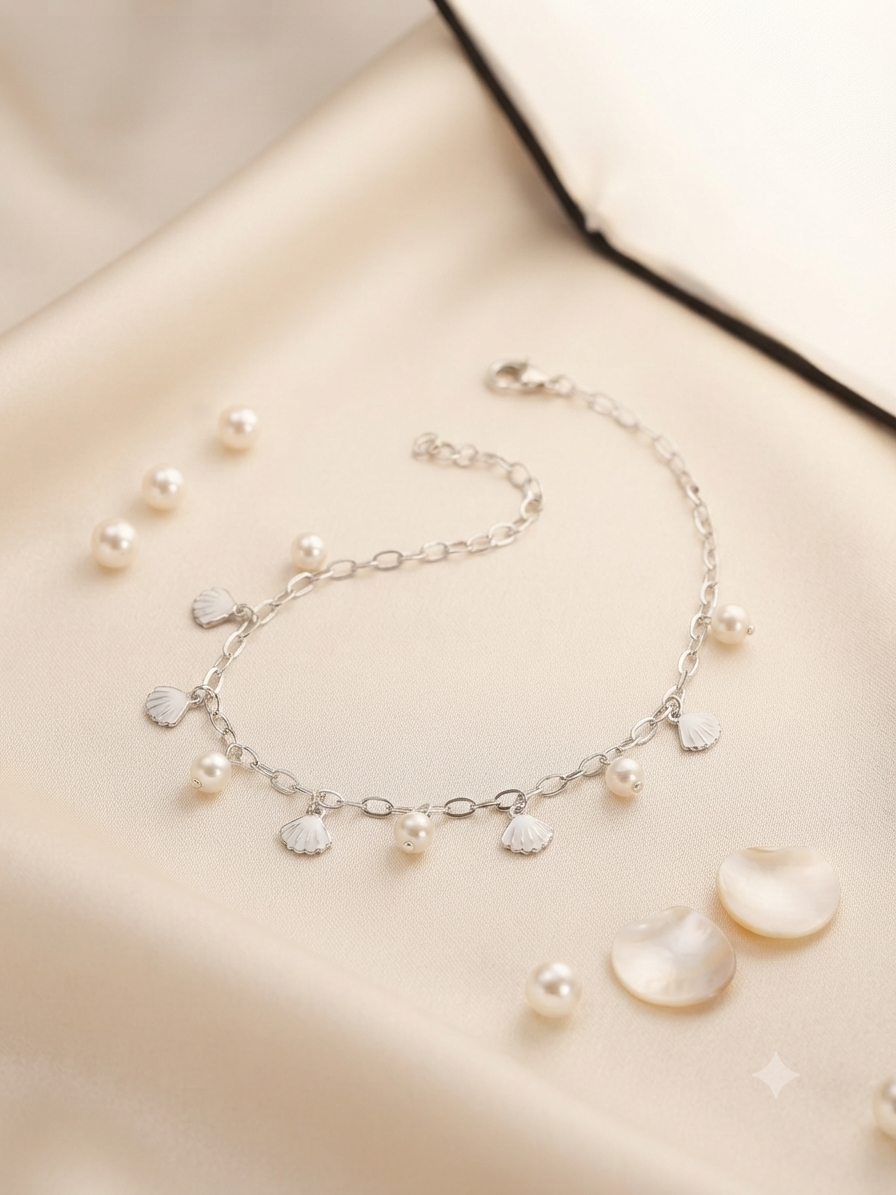 Pearl and seashell charm bracelet