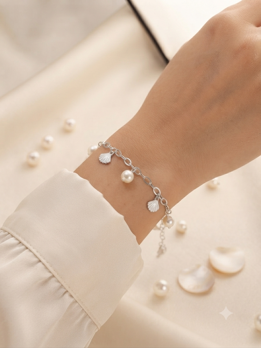 Pearl and seashell charm bracelet