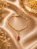 Rose gold paper clip chain bracelet with ruby teardrop charm