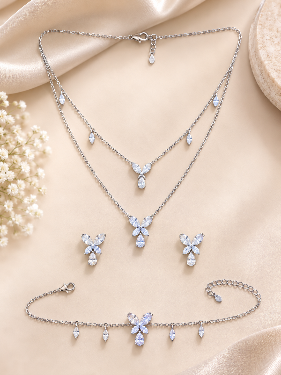 Crystal butterfly, layered necklace, earrings, and bracelet jewellery set