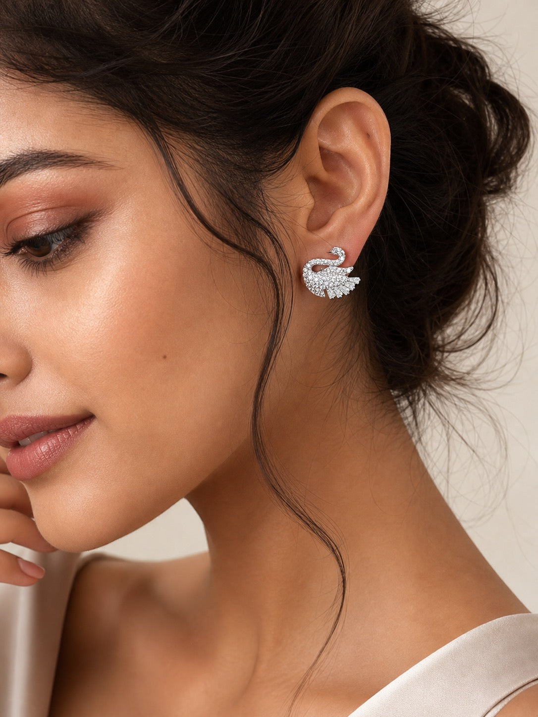 Silver Swan stud earrings for women